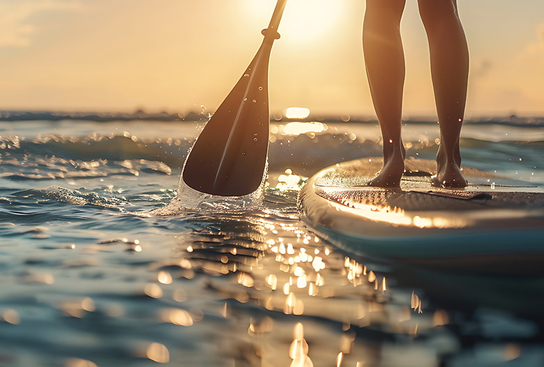 Paddle surfing Paddle surfboard with paddle in the sea