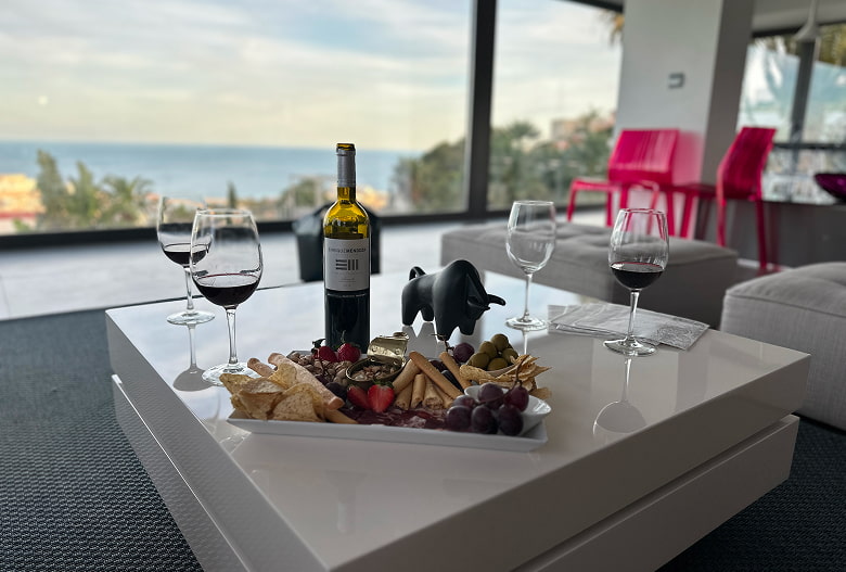 Personalised wine selection Table with appetisers and wine