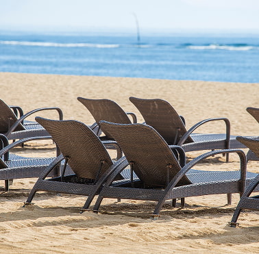 Sun loungers on the beach Sun loungers by the sea
