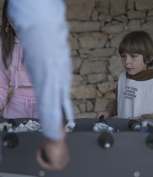 Sports and leisure facilities Family playing table football