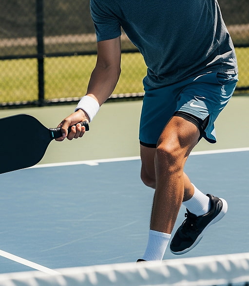 Villa Delta pickleball court Player on an outdoor pickleball court